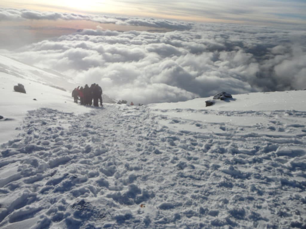 Walking through the snow from Stella Point to the Summit on Kilimanjaro