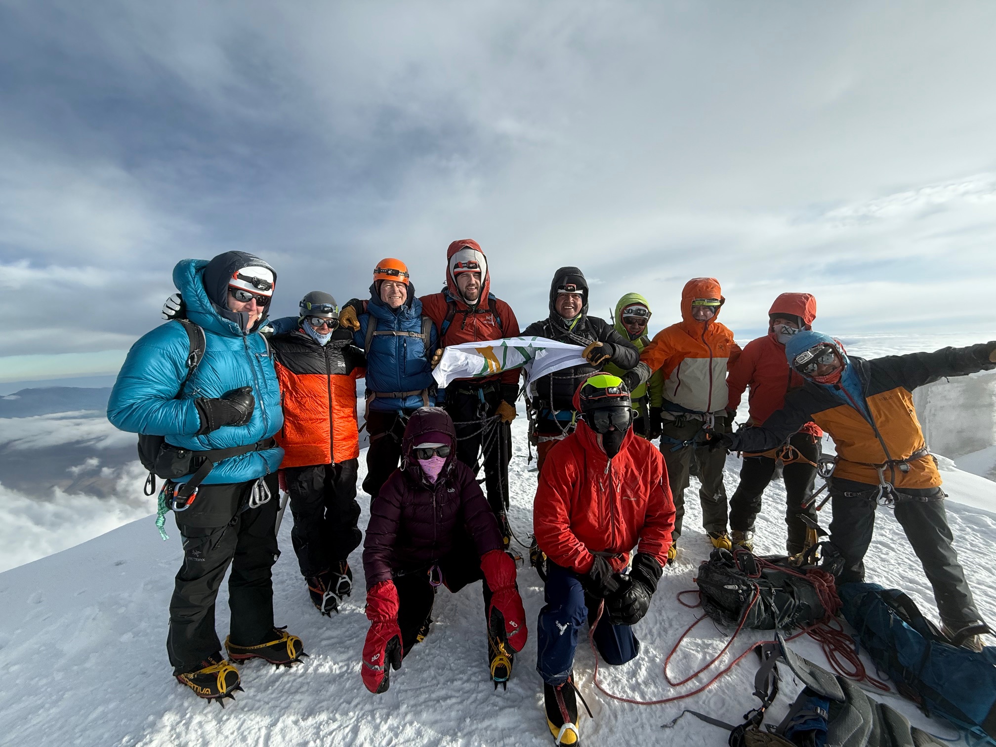 Ian Taylor Trekking team on the summit of Cotopaxi.